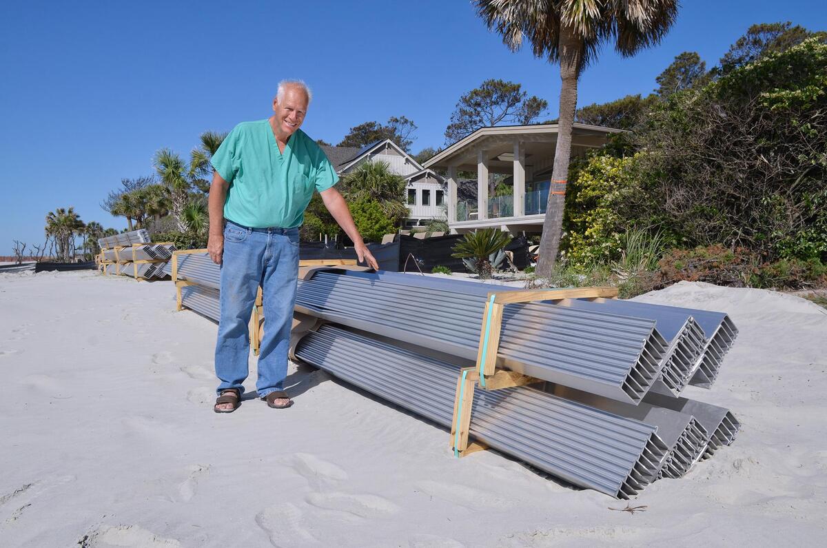 Bill Oberheim is one of five Sea Pines beachfront homeowners who is paying to have a seawall installed in front of their homes along Piping Plover Road. Here, he stands next to a stack of metal panels that will constitute the wall. They are to be driven 20-feet into the sand. This stretch of beach was heavily eroded during Hurricane Matthew in 2016 and again by Tropical Storm Irma in September. Since then, the beach has had its sand replaced. The seawall is being installed as an added precaution.