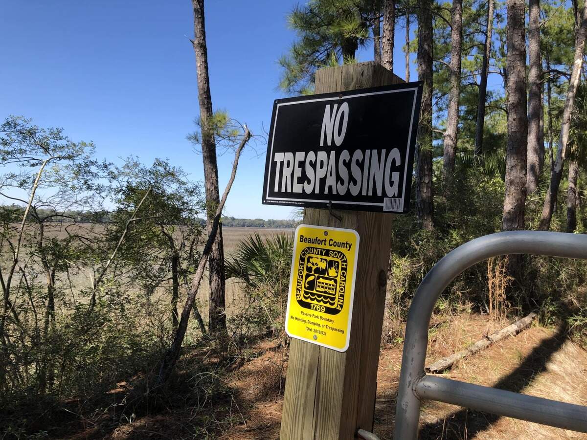 No trespassing signs block entry to the undeveloped Pinckney Point near Bluffton.