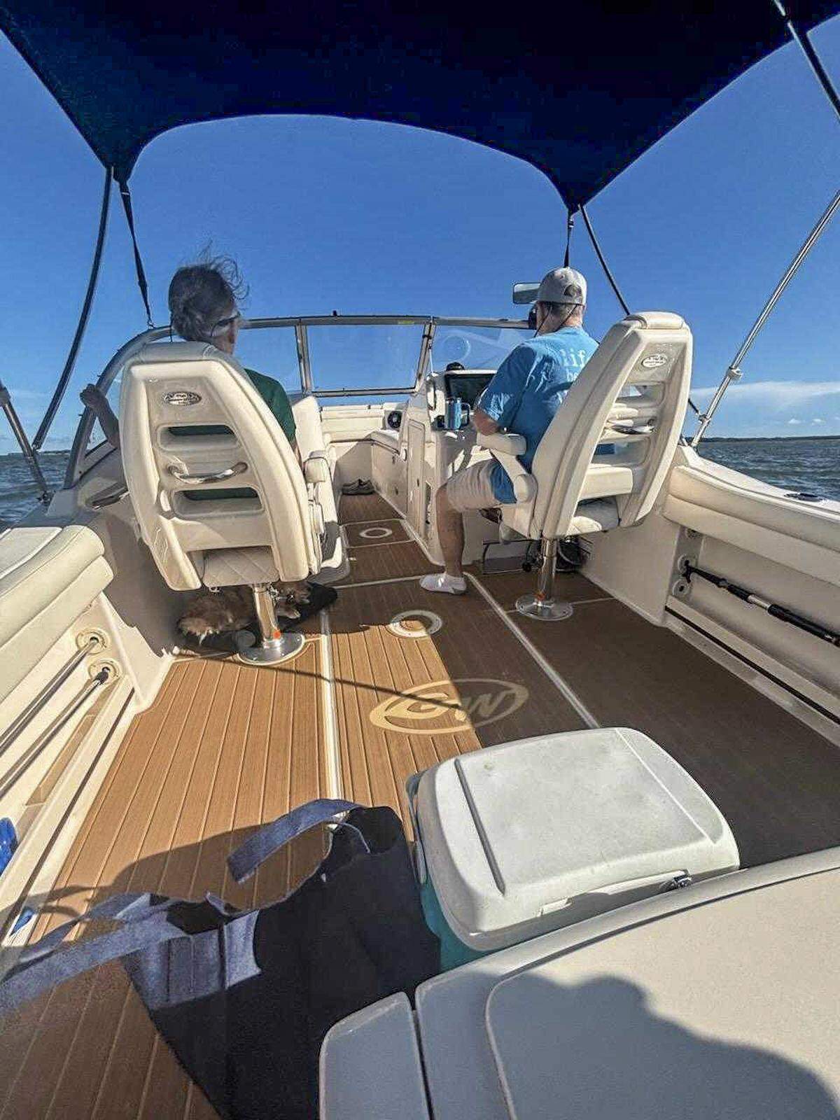 Pictured in this photo provided by John Zentmeyer and his wife Debra Ann Zentmeyer are their friends Rick Montgomery, driving the boat, and his wife Patsy Montgomery on their way to dinner at Skull Creek Dockside on June 27, 2025, on Hilton Head Island. While the Zentmeyers survived, the Montgomerys died of drowning after Rick’s boat collided with a channel marker as the group left the restaurant later that night.