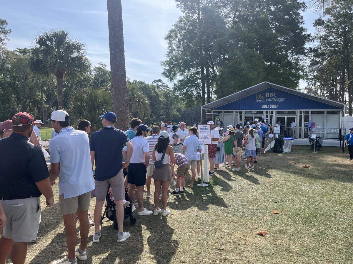 The line was long to the main merchandise tent Saturday morning at the RBC Heritage PGA Tour golf tournament on Hilton Head Island.