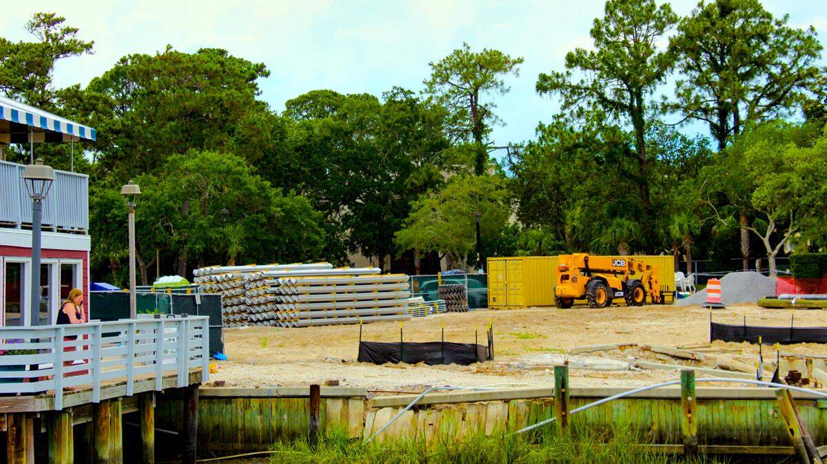 Stacks of sheet piling lie at the construction site near the Salty Dog on May 30, 2025. The old building at the site has been cleared away, but the project will likely still need to wait on local, state, and/or federal permits before work can begin.