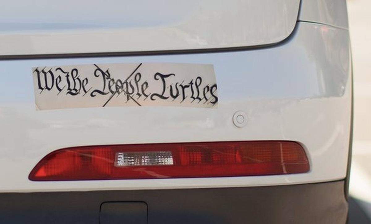 A rendering of a bumper sticker created by sea turtle-friendly beach lighting advocates.