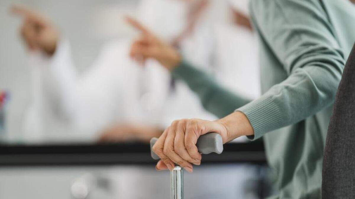 Hand on a cane