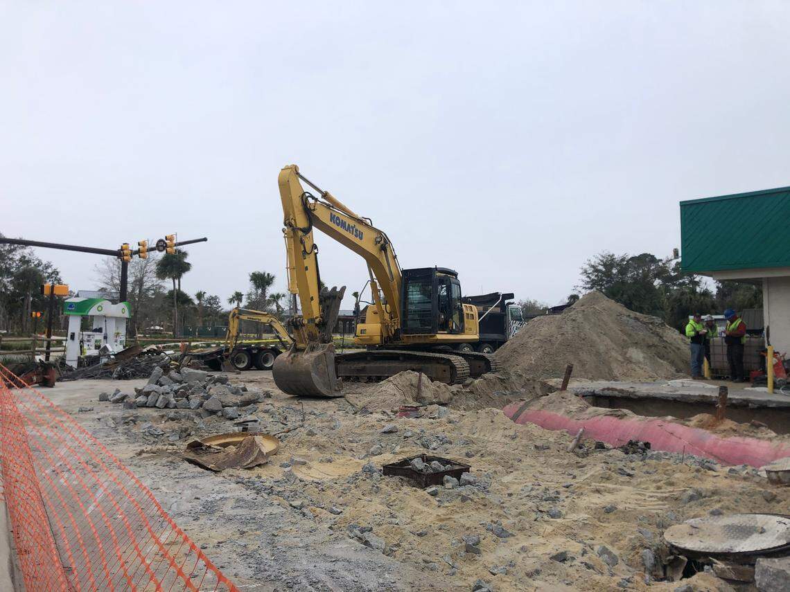 Crews remove underground gas tanks from the Kangaroo Express gas station March 2, 2021, on Pope Avenue.
