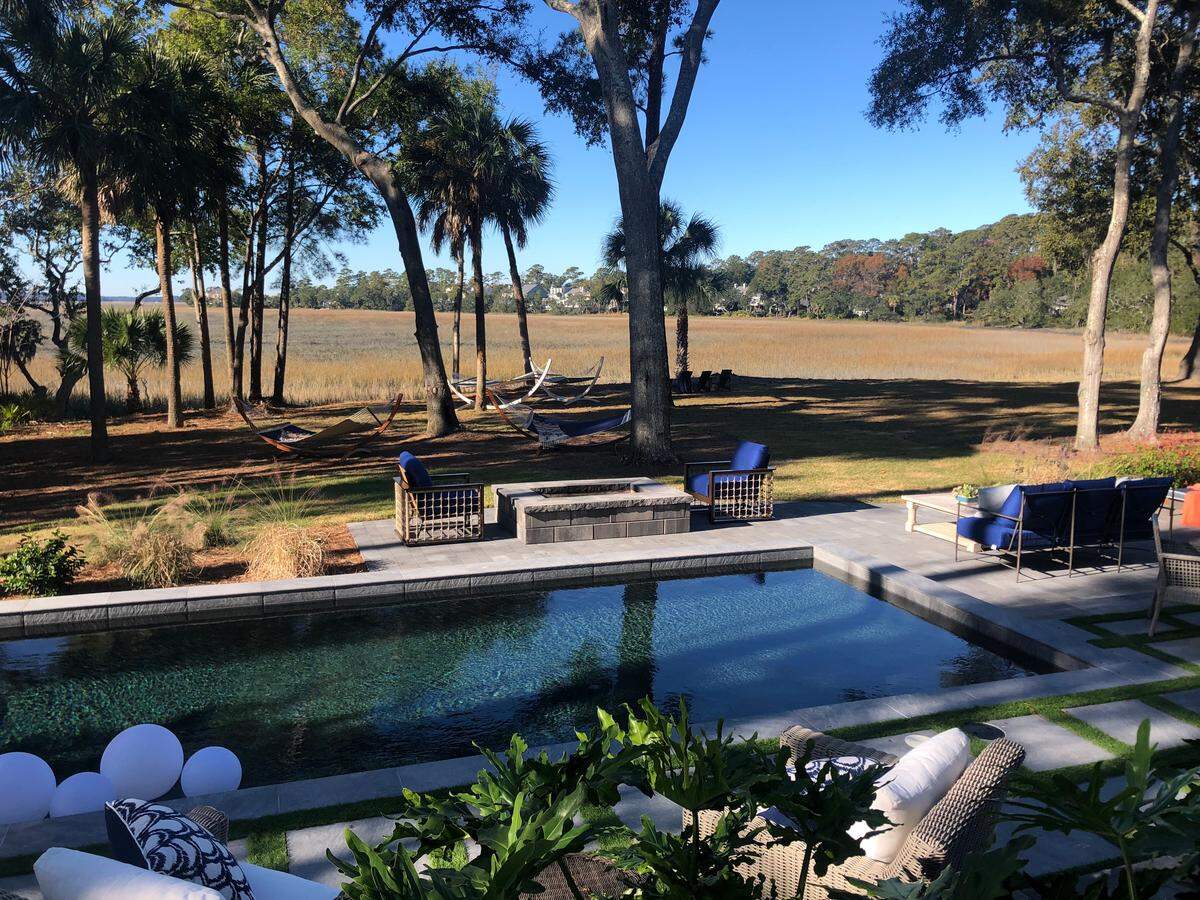 The outdoor pool, patio and grilling area of the HGTV 2020 Dream Home in Windmill Harbour on Hilton Head Island.