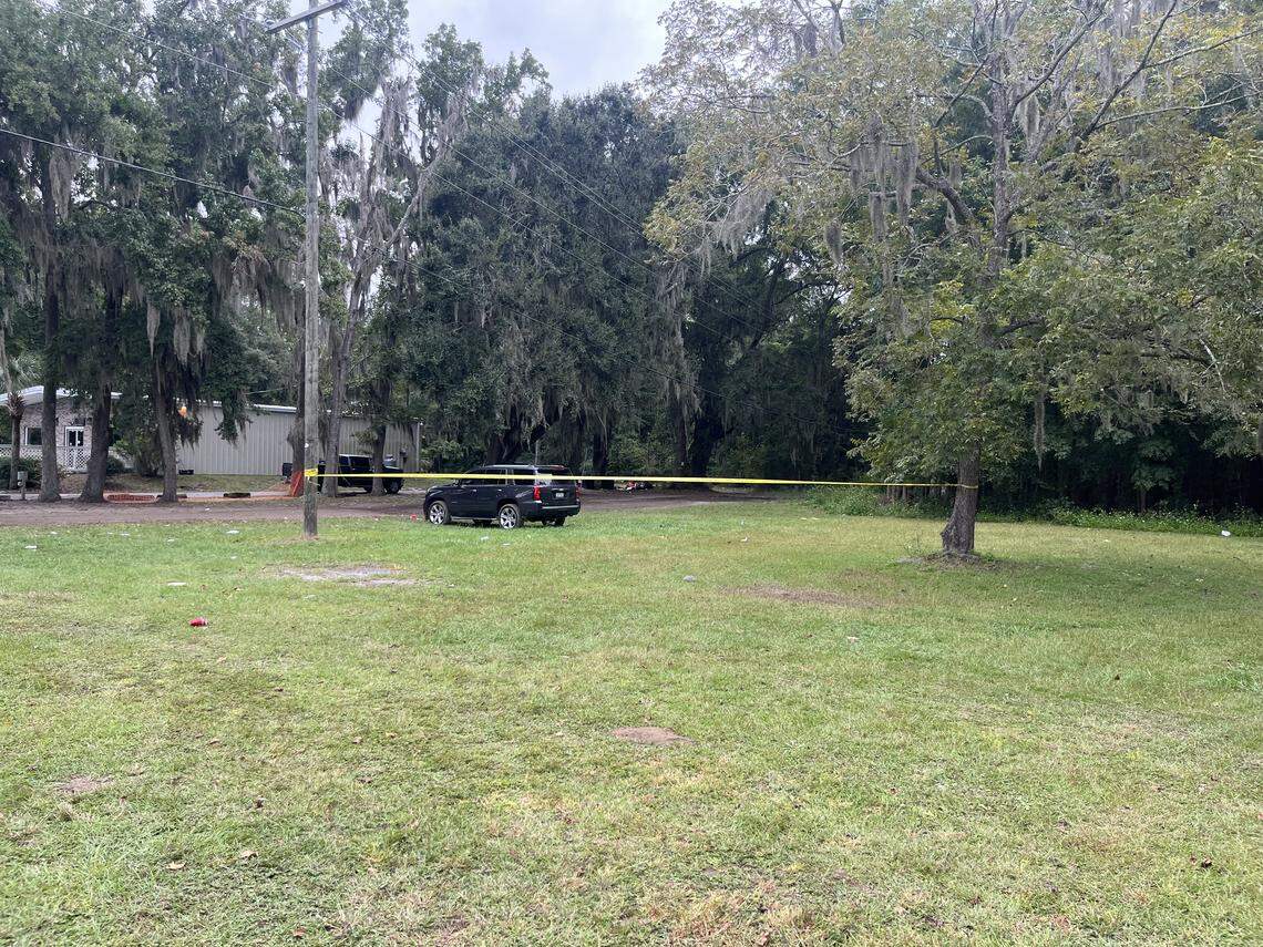 Yellow police tape marks the location of a shooting at Willie’s Bar an Grill Sunday morning.