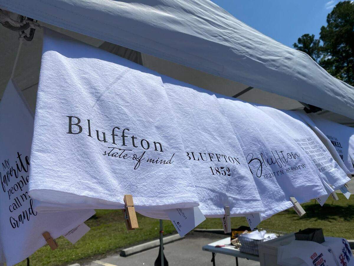 Tea towels by HandMade Beaufort, LLC for sale on April 25, 2015 at the drive-thru artisan market hosted by Southern Barrel Brewing Co. in Bluffton.