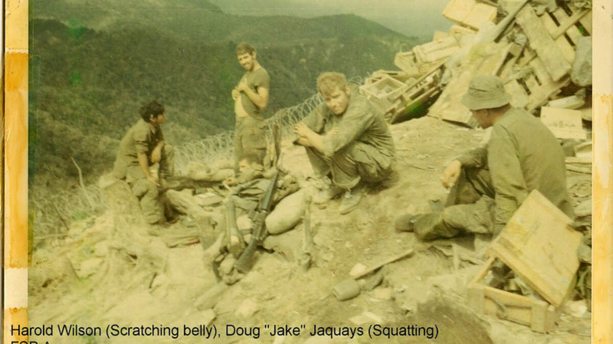 Harold Wilson, standing center, and Doug Jaquays, squatting, with fellow Marines at FSB Argonne in Vietnam in November 1968. 