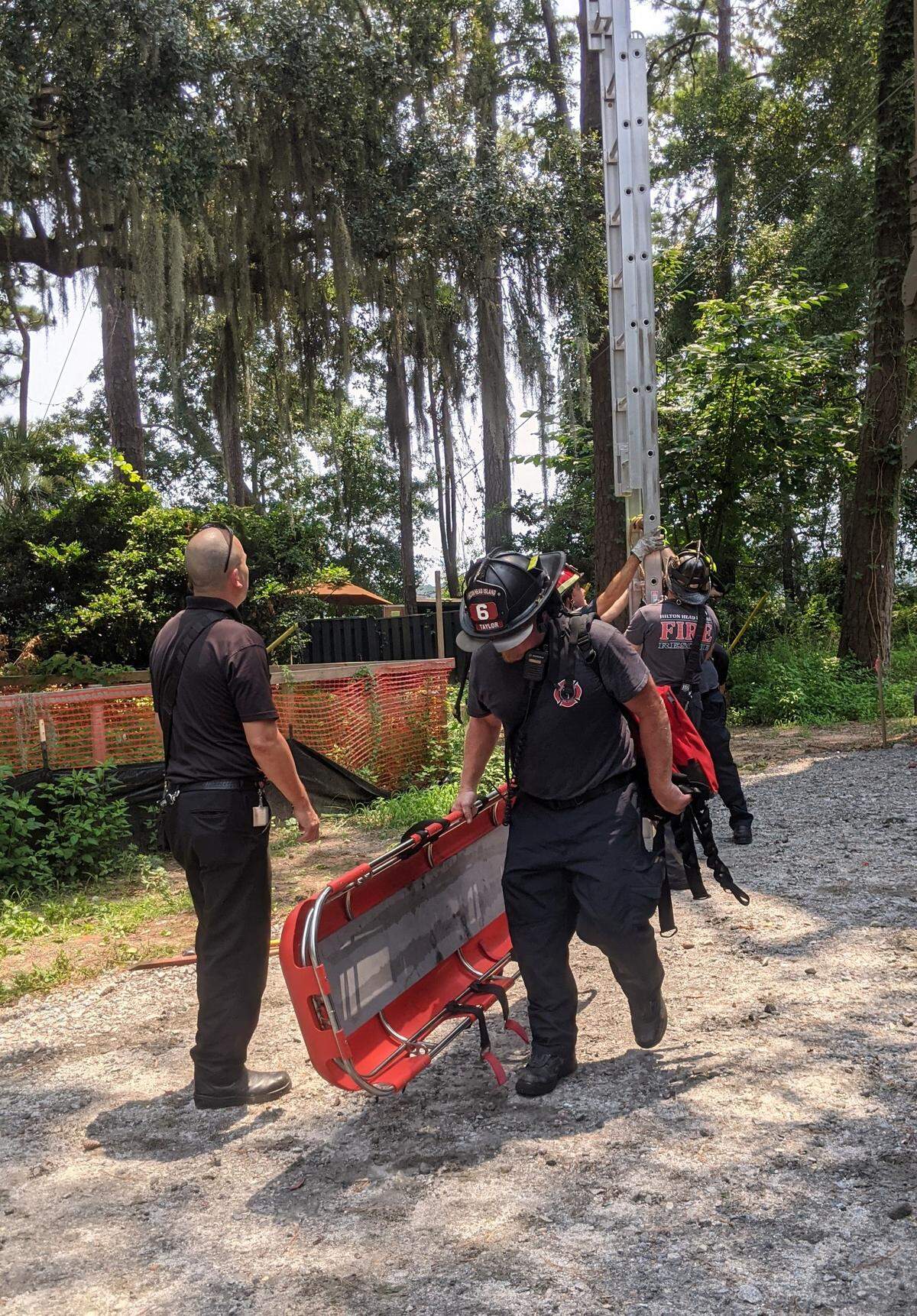 Hilton Head Fire and Rescue officials respond to a man injured on a zip line at Adventure Hilton Head on July 23, 2021.
