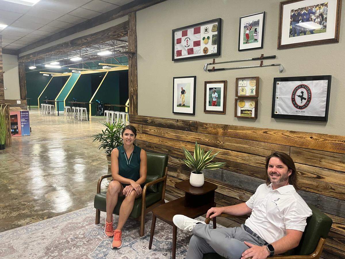 Andrea Michel and Chad Troutman are the owners of Iron and Iron golf club, which includes a bar, a lounge area and four simulator bays where you can experience golf courses from across the country or work on specific aspects of your golf game. The new Beaufort business is opening on Friday.