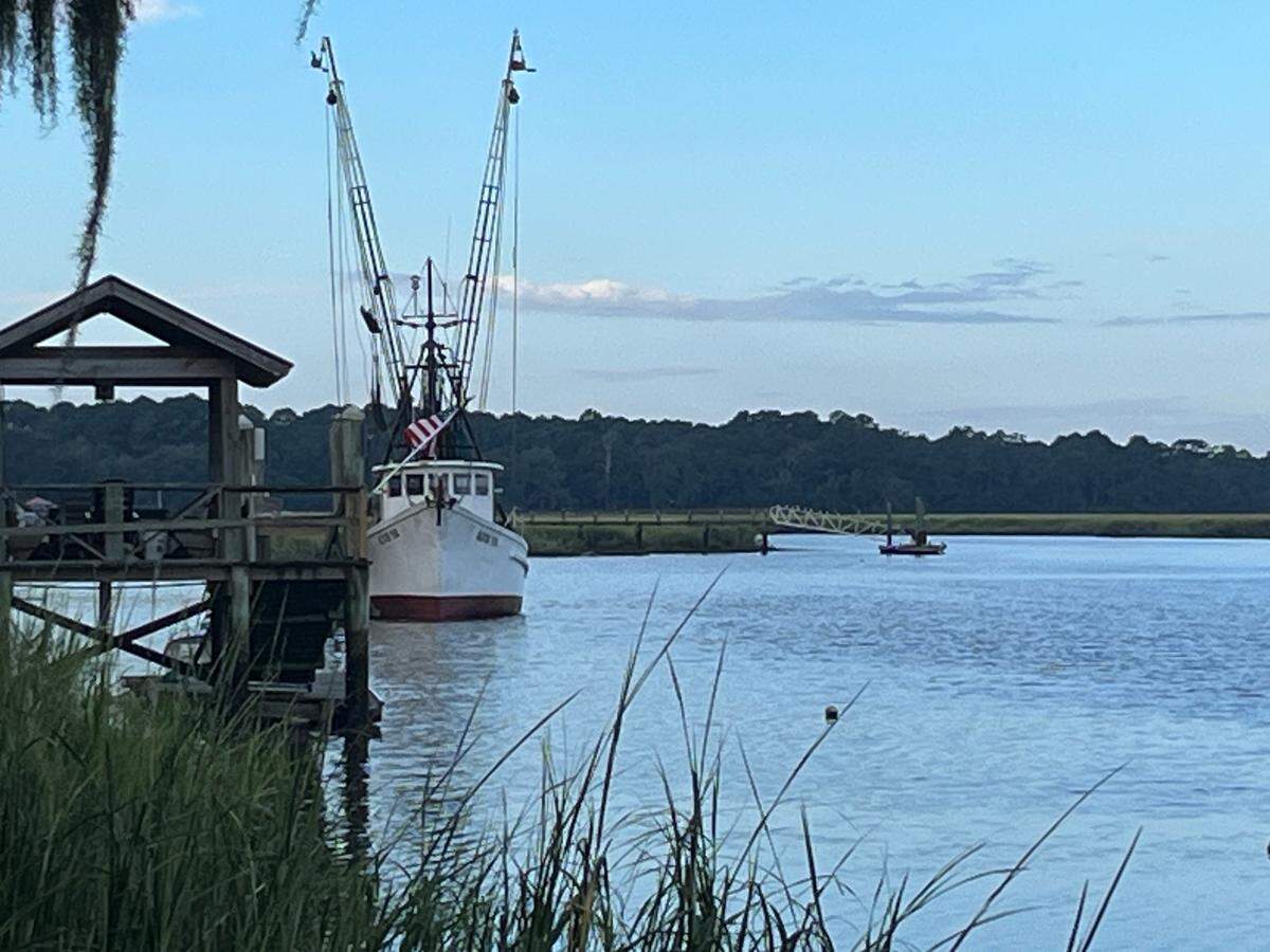 A shrimp trawler at a dock on Village Creek on St. Helena Island. The Southern Shrimp Alliance is asking shrimp state governors to press the federal government for a disaster declaration because of plummeting prices. Prices are dropping because of a glut of imported farm-raised shrimp, the group says.