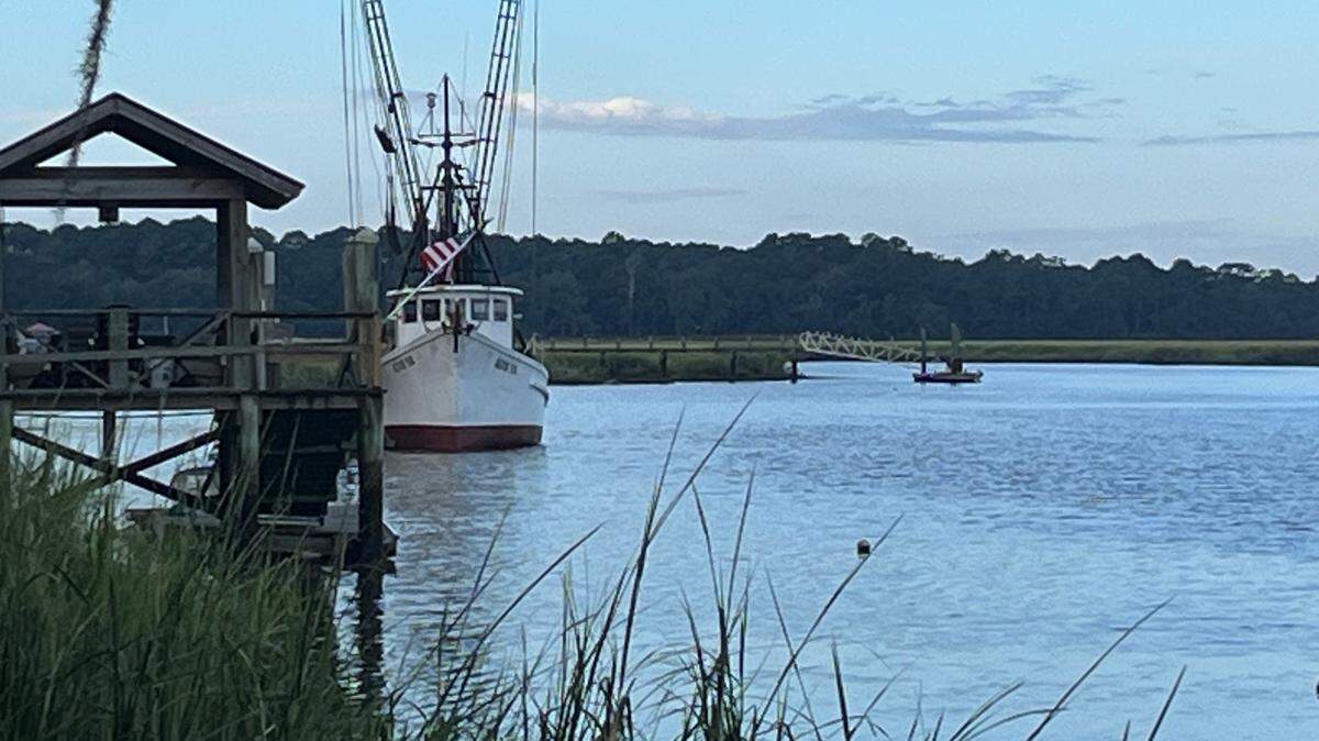 A shrimp trawler at a dock on Village Creek on St. Helena Island. The Southern Shrimp Alliance is asking shrimp state governors to press the federal government for a disaster declaration because of plummeting prices. Prices are dropping because of a glut of imported farm-raised shrimp, the group says.