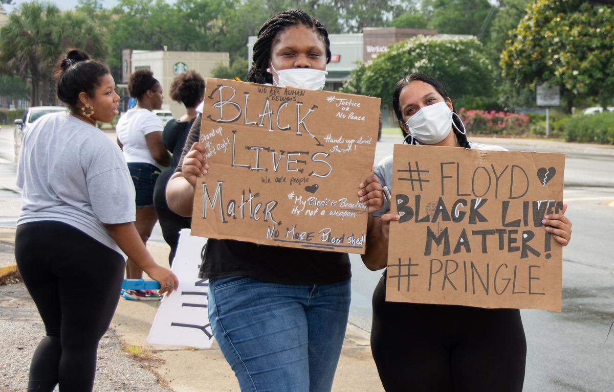 Protesters gathered at Ribaut Road and Boundary Street in Beaufort on Sunday, May 31, 2020, against institutional racism and police brutality across the nation