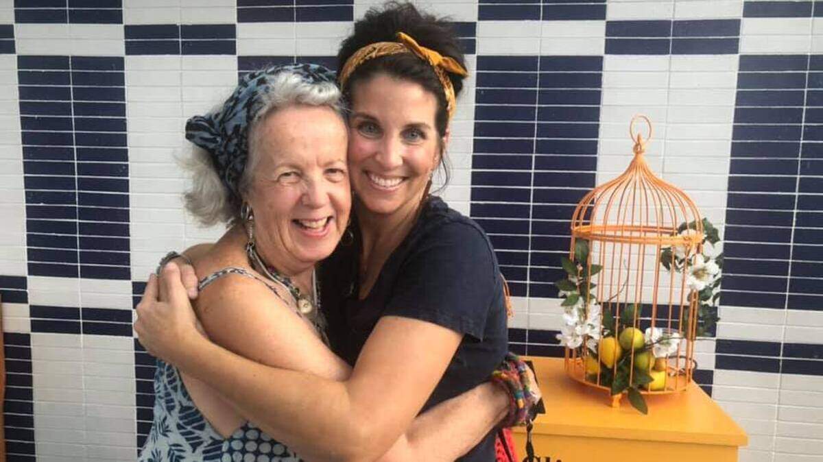 Diana Riggle and Meredith Davis having fun at the Perry Lane Hotel with the The Fabulous Equinox Orchestra.