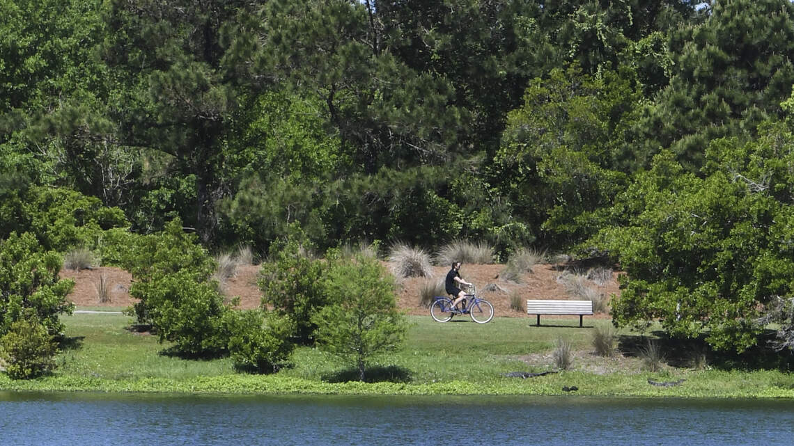 Hilton Head man transformed drainage pond into paradise. Now it will be named for him