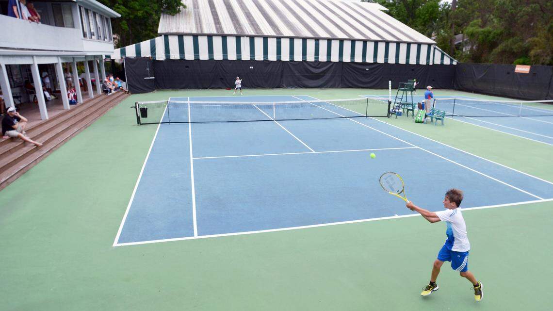 Raising a racquet