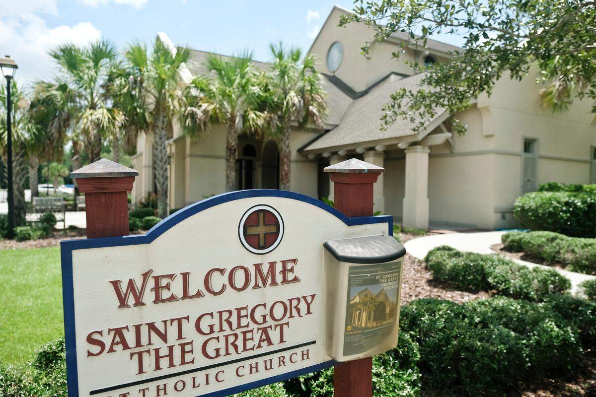 The welcoming sign to Saint Gregory the Great Catholic Church as seen on Sunday, July 29, 2018. The Bluffton congregation has grown to more than 10,000 congregants since its dedication of Saint Andrews Chapel, its original church, in 1932.