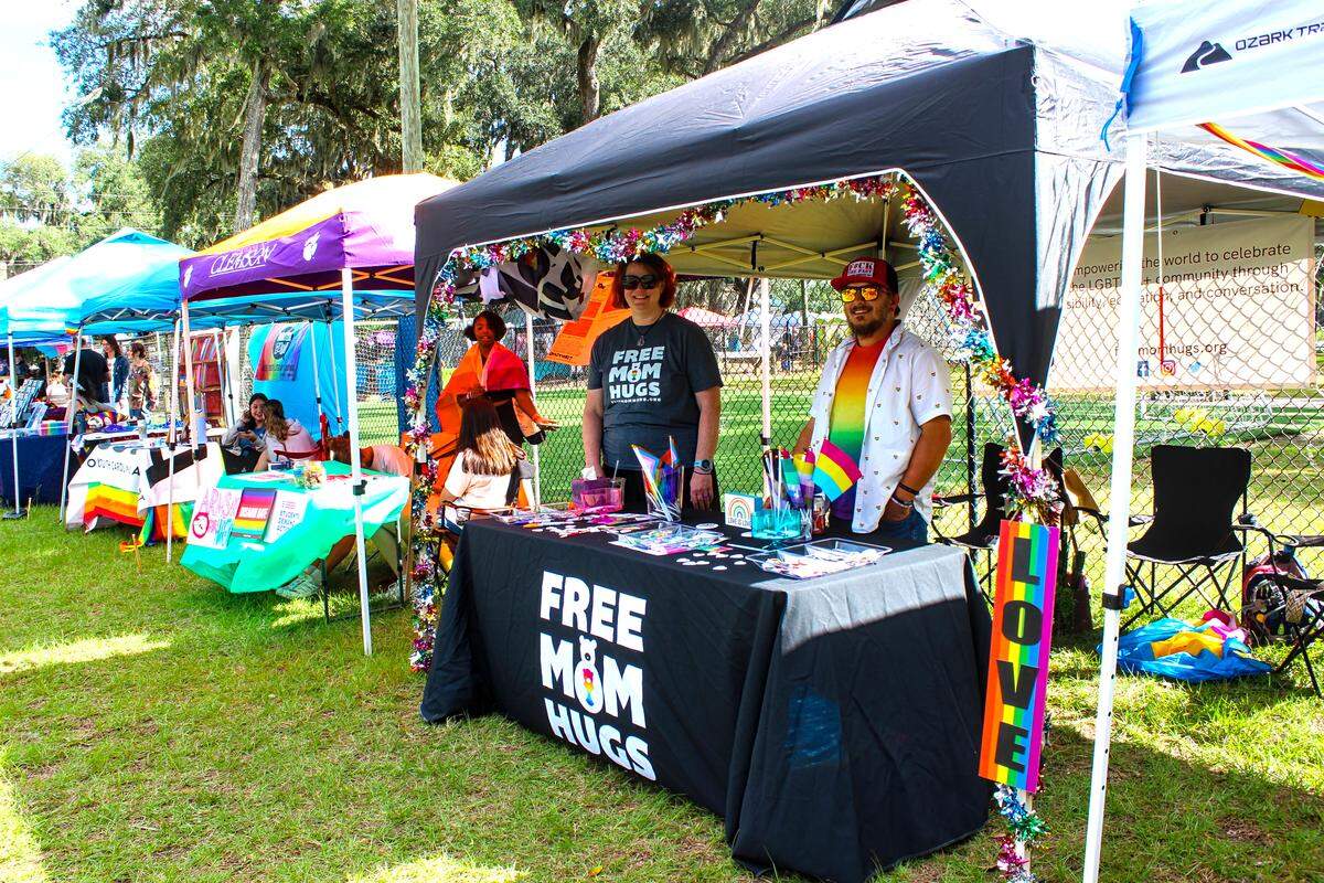A “free mom hugs” booth at Lowcountry Pride Celebration in Port Royal offers hugs to anyone that needs one. When people come out, Beaufort local Brigid Fackrell (left) said it’s important to “be there” for them.