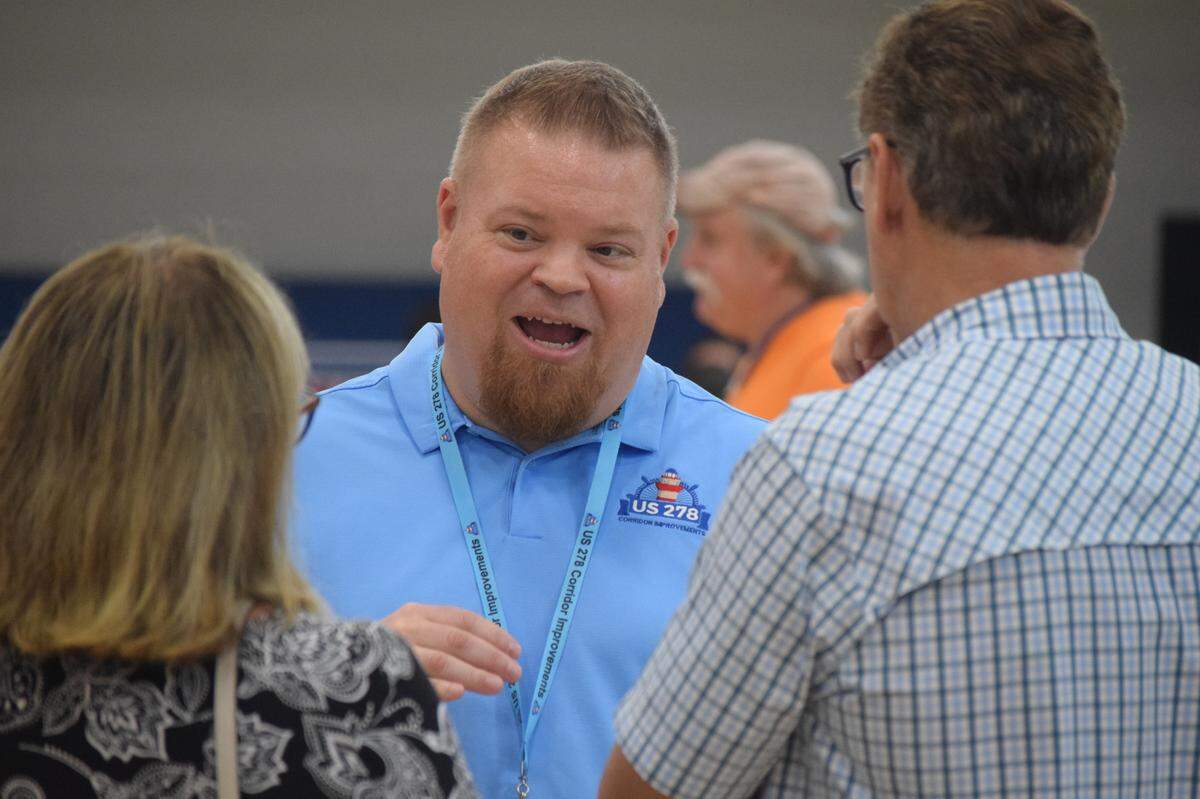 Craig Winn, SCDOT project manager, speaks with people at the U.S. 278 public hearing on Hilton Head Island on Thursday, July 22, 2021.