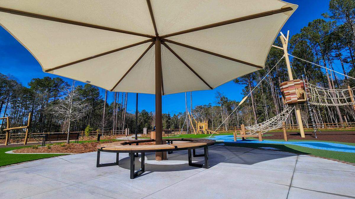 A large umbrella offers shade and a place to rest as photographed on Jan. 28, 2025, is featured in one section at the New Riverside Barn Park set for a grand opening on Feb. 22 in Bluffton.