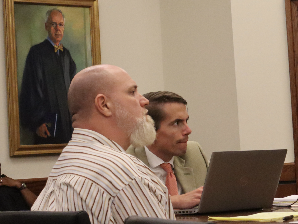 Brian David Walls, 43, listens to a 911 dispatcher give her testimony on Monday afternoon at the Beaufort County Courthouse. Walls was convicted Wednesday of rape and kidnapping, receiving two life sentences on top of his previous 40-year punishment for murder.