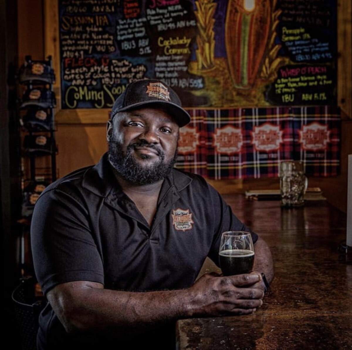 Juan Brantley, of Hilton Head Brewing Company, with the brewery’s latest release: the Beeyna Lager.