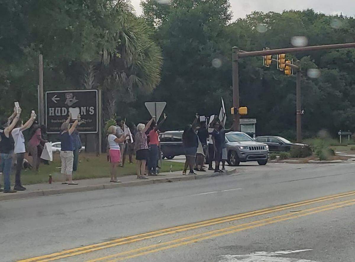 People protest racism and police brutality on Hilton Head Island on Sunday, May 31 at the corner of U.S. 278 and Squire Pope Road.