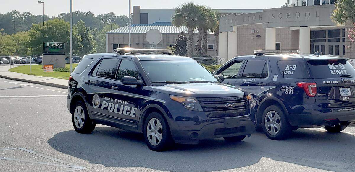 Two Bluffton Police Department SUVs are seen outside of Bluffton High School in this 2018 file photo.
