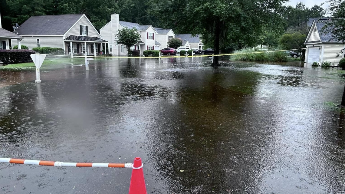 A photo taken in 2024 at The Farm at Buckwalter shows blockades discouraging travel through a portion of flooded roadway. Bluffton police had closed one of the neighborhood’s two entrances as rainfall from Tropical Storm Debby continued to inundate the low-lying area.