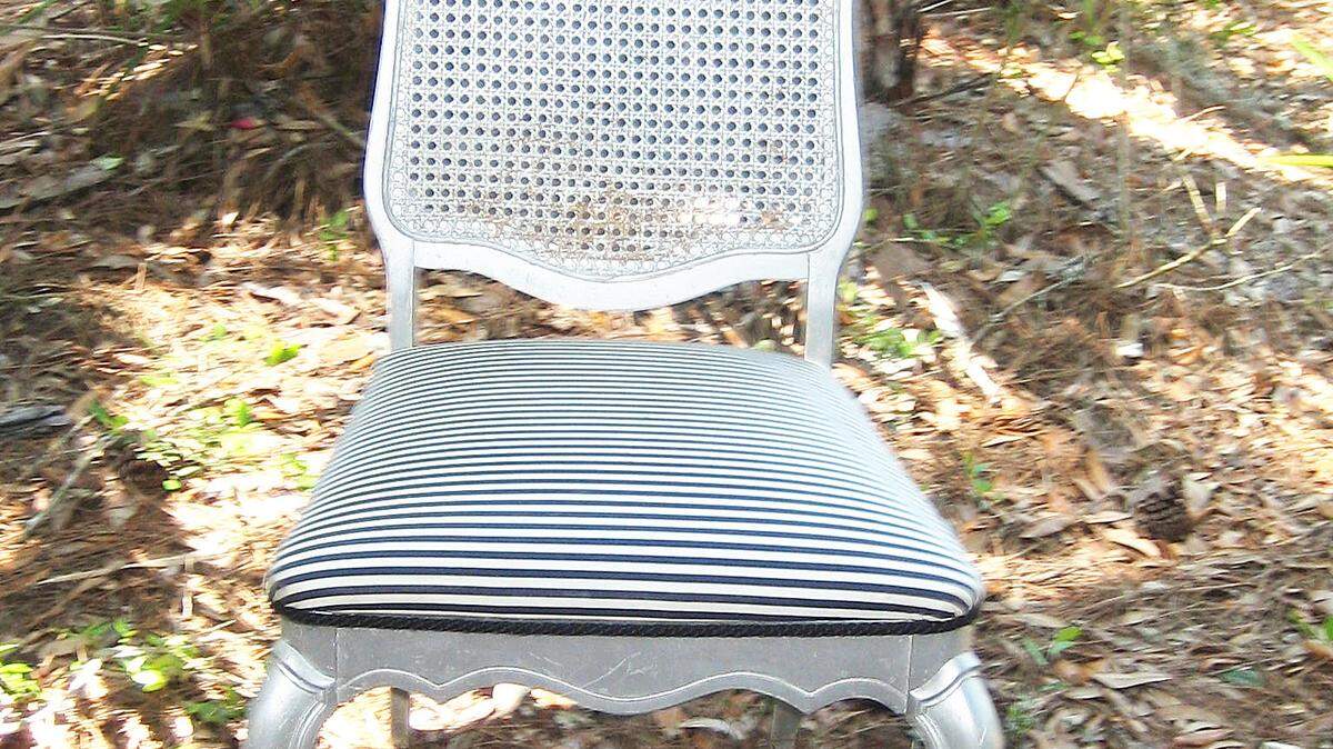 When Joanne Baumgart-Schellgell bought this chair from a thrift store, it was painted silver and had a black and white striped seat cushion. She knew it was in need of a DIY makeover.