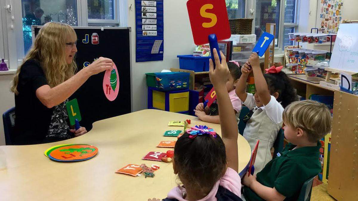 Marianne Shell, a teacher at Hilton Head Island Early Childhood Center, leads a literacy exercise for pre-kindergarten students Oct. 14, 2015.
