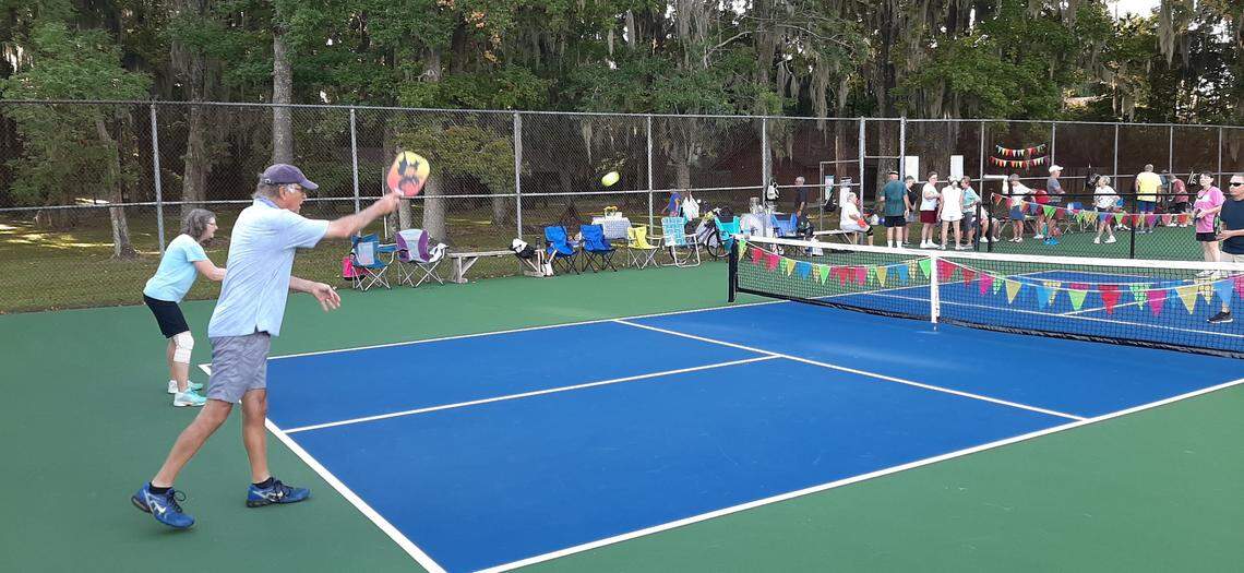 Gene Grace returns a shot on one of two new pickleball courts at Southside Park in Beaufort Wednesday morning. “It’s great fun,” Grace says.