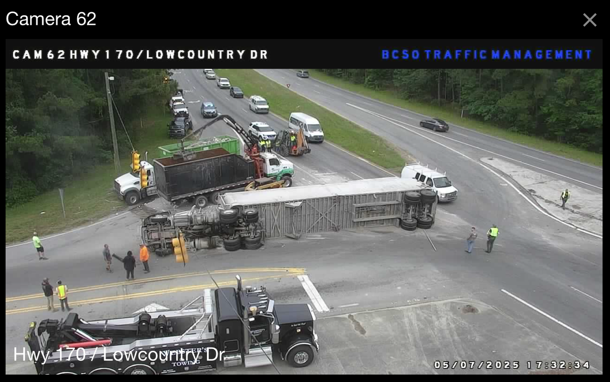 Almost 2 hours after the incident, towing crews worked to move a semi truck that overturned in the roadway of S.C. 170 (Okatie Highway) around 3:45 p.m. on May 7, 2025. Police said no other vehicles were involved.