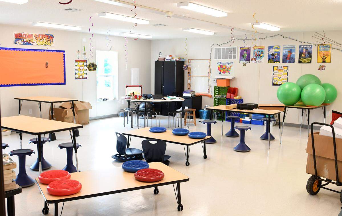 A classroom in the mobile classroom building at Pritchardville Elementary. The school offers their students a wide variety of flexible seating options – from bean bag chairs to stool-like chairs. The mobile is structured more like a traditional brick and mortar building with classrooms on both sides of a central hallway.