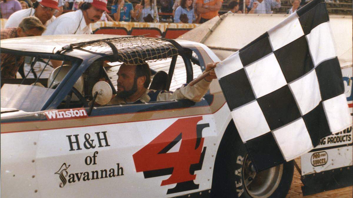 Pictured in the drivers seat is David Into, also known as the  King of the Oglethorpe Speedway, pictured on March 25, 1984