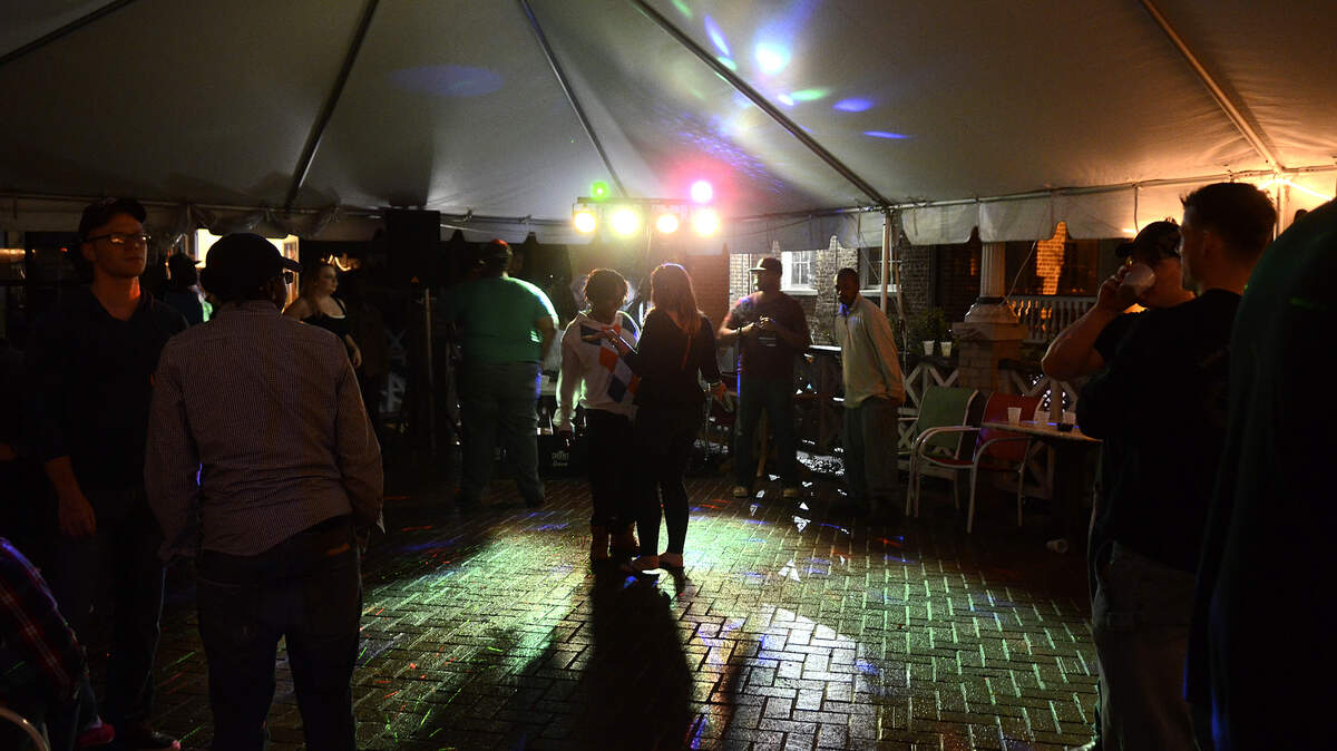 Patrons gather on the covered patio at Panini's last March on Bay Street in downtown Beaufort.