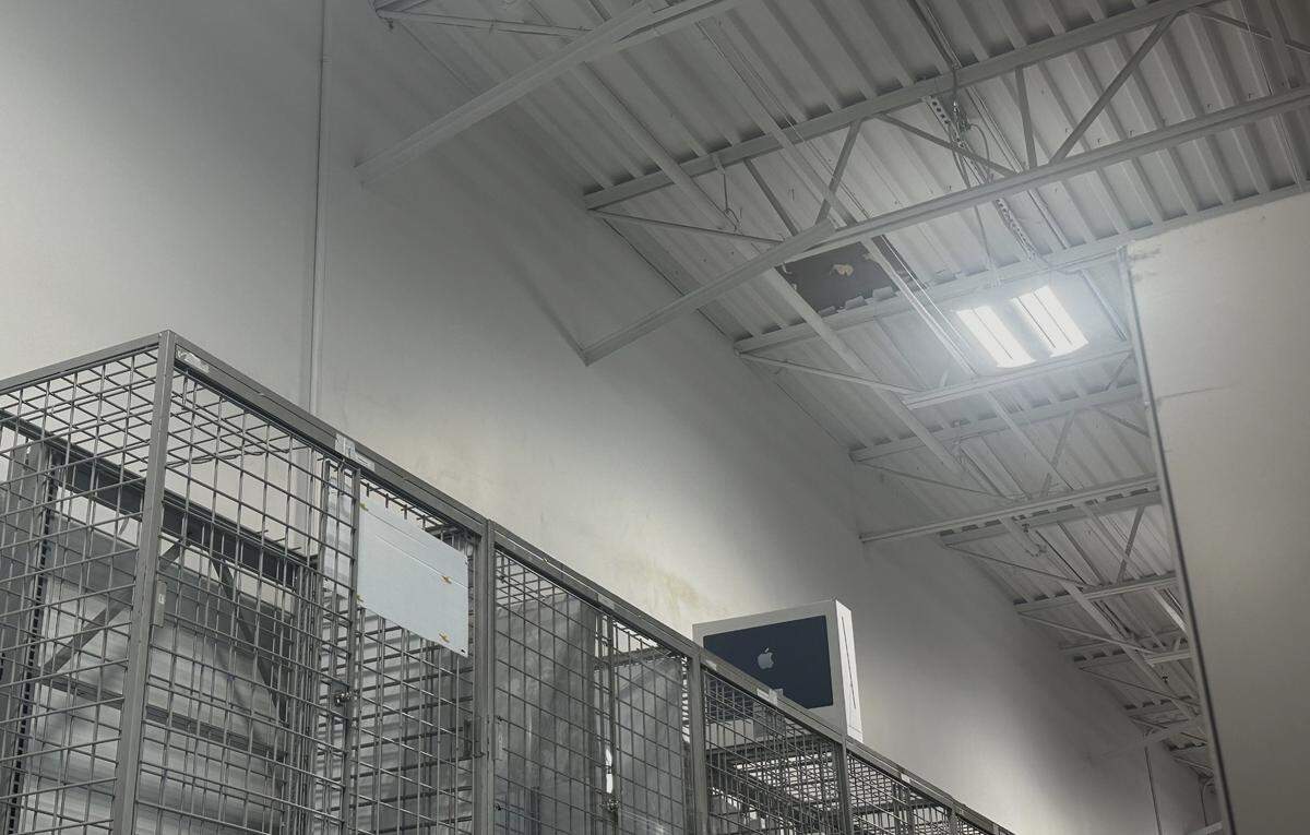 A photo taken Monday inside the Best Buy store in Bluffton shows a covered-up hole in the ceiling where an unknown burglar sawed his way into the building late Thursday night. The suspect used an extension ladder to climb through the hole to the security cages below, according to the Beaufort County Sheriff’s Office.