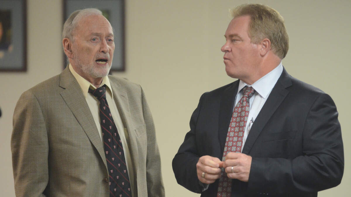 The Beaufort County School Board held a special meeting Sept. 21, 2015, to discuss issues surrounding the hiring of Superintendent Jeff Moss' wife to an administrative position with the district. Here, Moss, right, speaks with board member Paul Roth before the meeting.