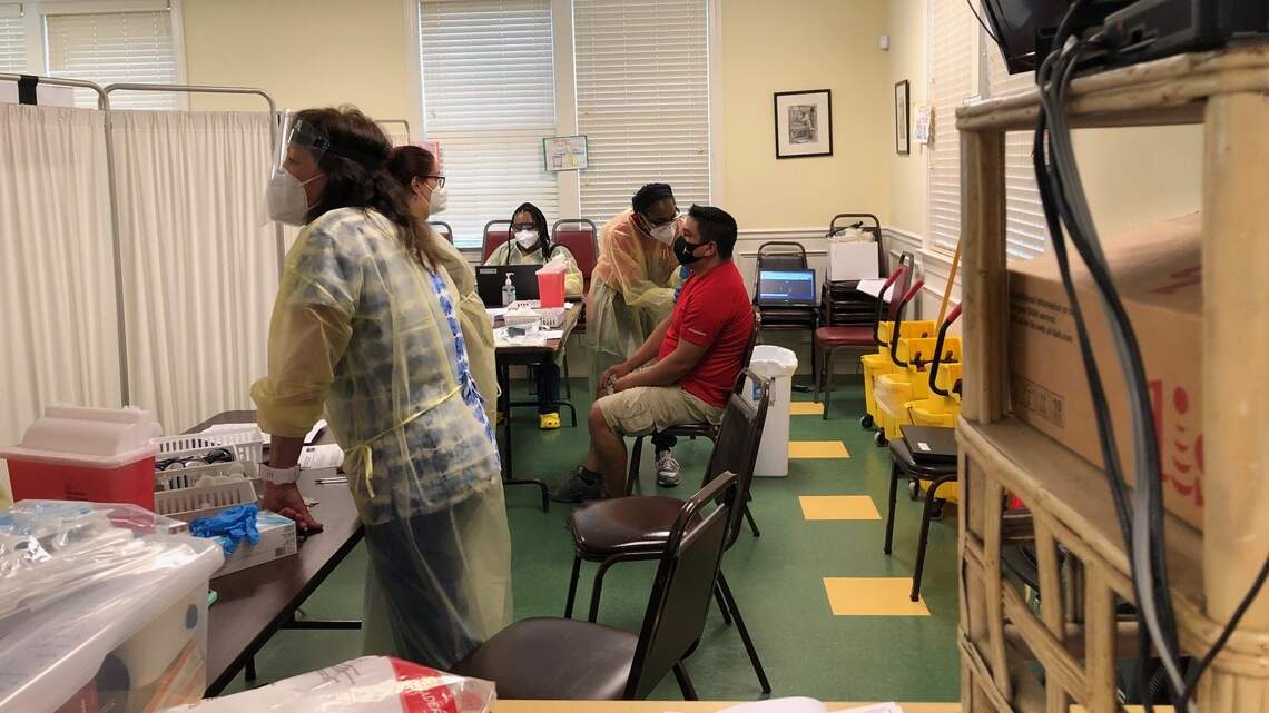 Two hours inside a COVID-19 vaccine clinic for South Carolina farm workers