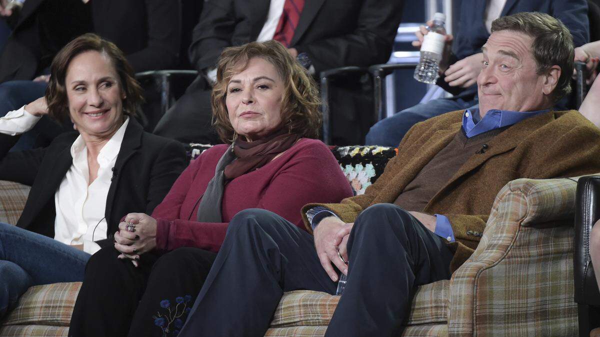 Laurie Metcalf, left, Roseanne Barr and John Goodman participate in the "Roseanne" panel during the Disney/ABC Television Critics Association Winter Press Tour on Monday, Jan. 8, 2018, in Pasadena, Calif.