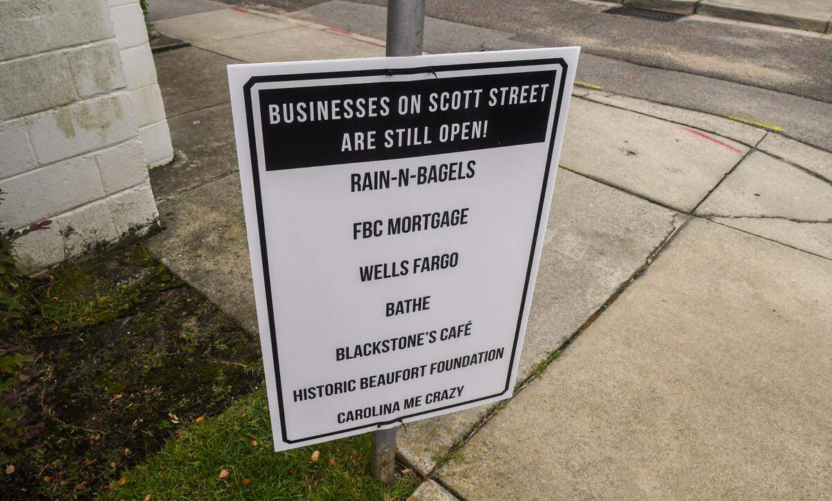 Signage posted at both ends of Scott Street are put in place to alert customers of the businesses that remain open as photographed on Thursday, Sept. 28, 2023 during the construction of a hotel project underway by 303 Associates in downtown Beaufort.