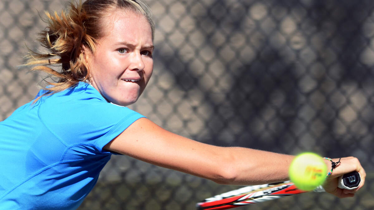 Marie Bouzkova bears down on the ball during her singles final match with Natalie Mikhlyantseva in the Shipyard Cup tennis tournament on Sunday.