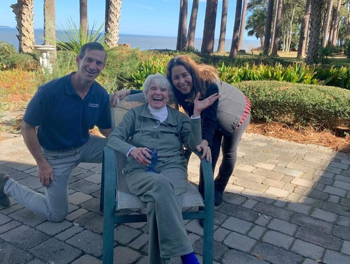 Jeanette Cram (center) at home with her caregiver Julia Marshall and Synergy HomeCare franchise owner Mark Piegza at Cram’s Hilton Head Plantation home.