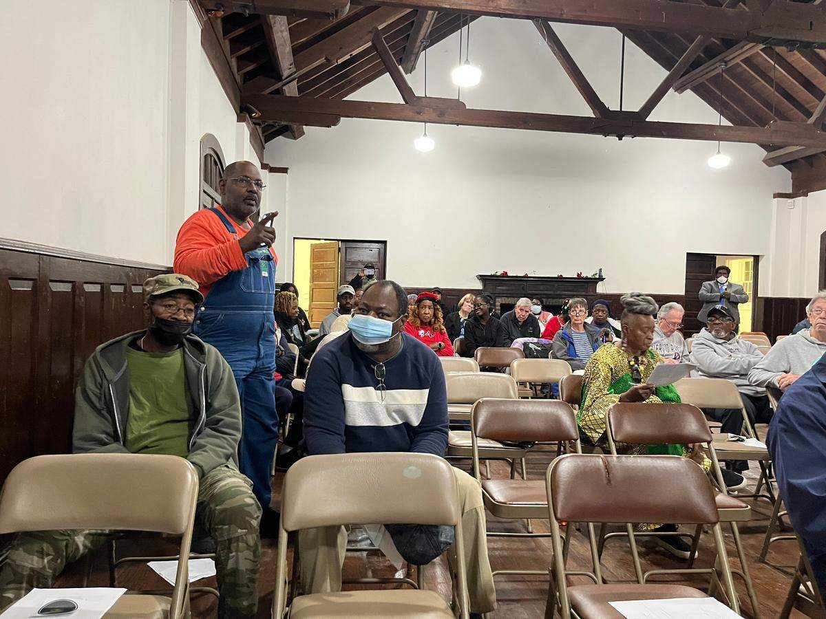 Tony Jones speaks during at a meeting called Thursday at Penn center to to inform residents about a proposed golf course and housing development on the Pine Island/St. Helenaville property at Penn Center Thursday, Dec. 16. Many of the 85 people who attended, including Jones, said they were opposed to the project.