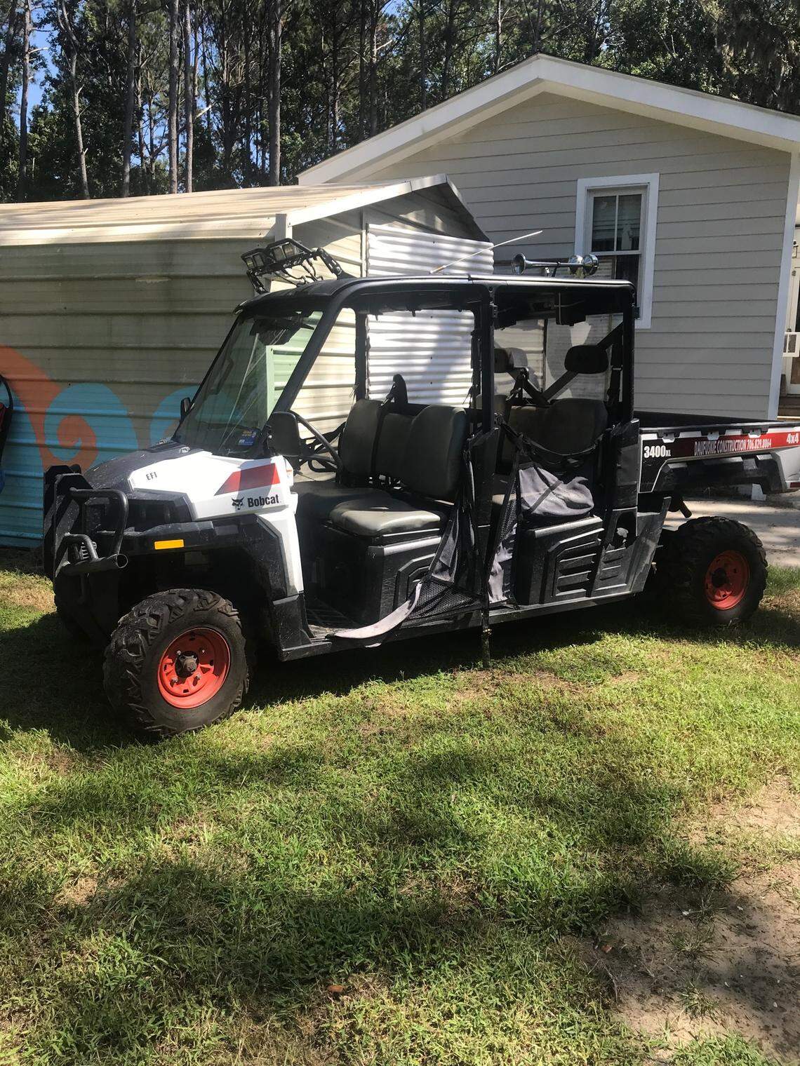 Melissa Davis’ utility cart, which she and her husband use to move construction materials around Daufuskie Island. The DMV will not permit these types of vehicles, meaning that Daufuskie residents are getting tickets for driving unregistered vehicles on the small island.