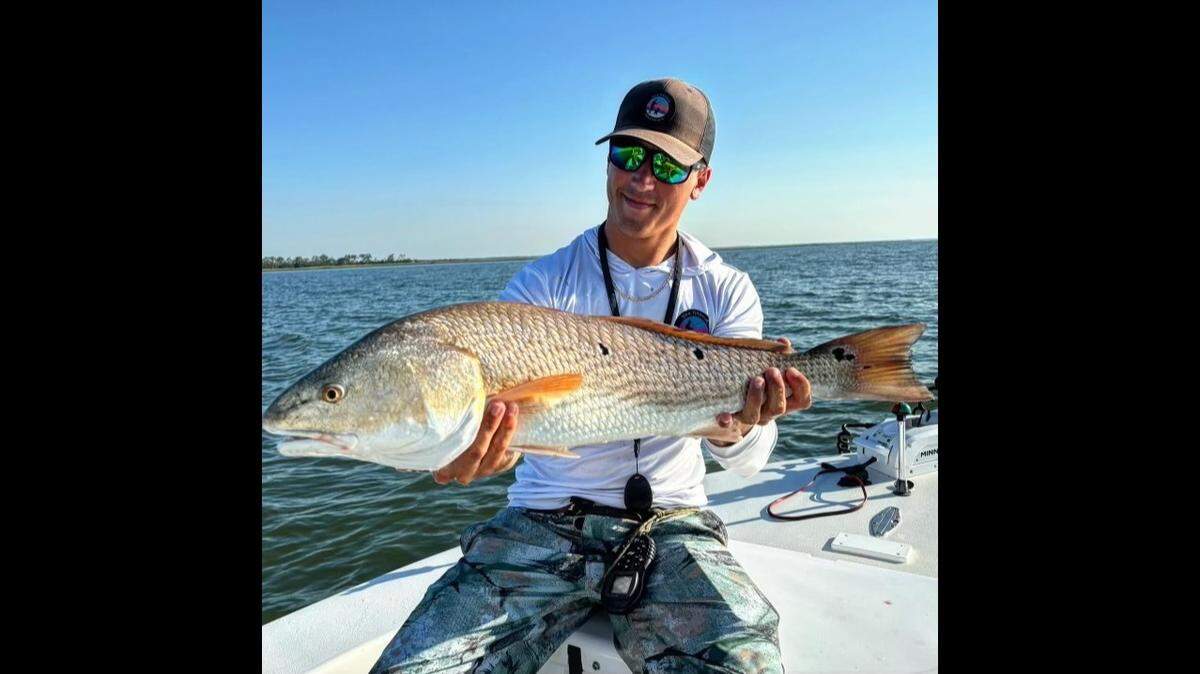 Tommy Buskirk of Sea Island Adventures holds a bull red that was caught before Tropical Storm Debby hit earlier this month. Fishing was hot before and after the storm, area charter boat captains say.