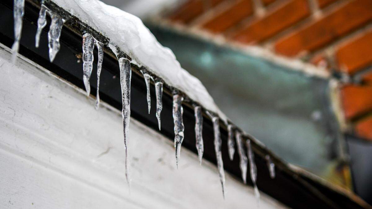Icicles form on a roof’s overhang on Jan. 23, 2025 in Savannah, Ga. after Winter Storm Enzo brought snow and ice to the southeast coast.