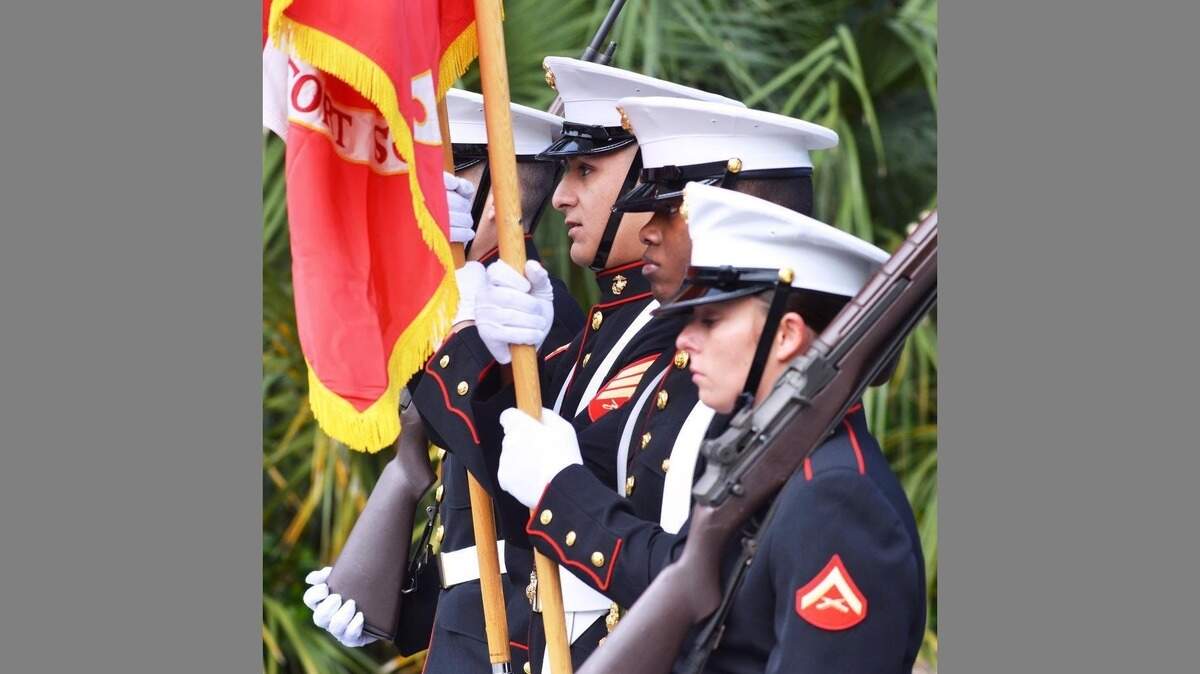 The Marine Corps color guard marches down Carteret Street during Saturday’s Beaufort Veterans Day Parade.
