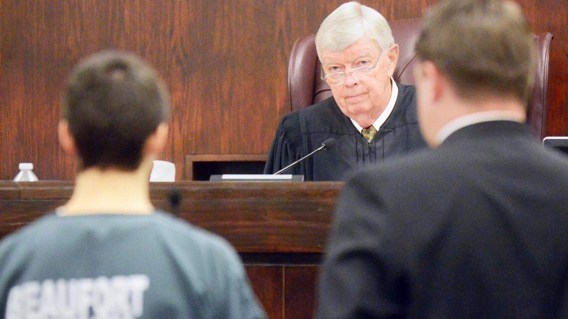 Judge Thomas Cooper accepts a guilty pleas from Austen Almeida, left, during a hearing at the Beaufort County Courthouse on Wednesday. Almeida pleaded guilty today to three weapons charges and disturbing schools in connection with a May 1 incident at Bluffton High, where he was a student and brought a gun, knives, gas, a lighter -- which caused a lockdown. He pled guilty to possessing an explosive device, carrying weapons on school property and unlawful firearm possession, and is to be sentenced April. The Solicitor's Office plans to have a state psychiatrist review Almeida's psychological evaluation and conduct its own. He was later denied bond.