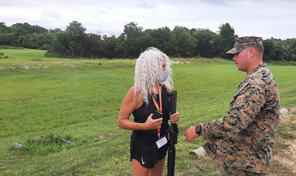 Tammy Blau, an art teacher from southeastern Michigan, gets instruction from Sgt. Dalton Jenkins during the Educators’ Workshop at Marine Corps Recruit Depot Parris Island.